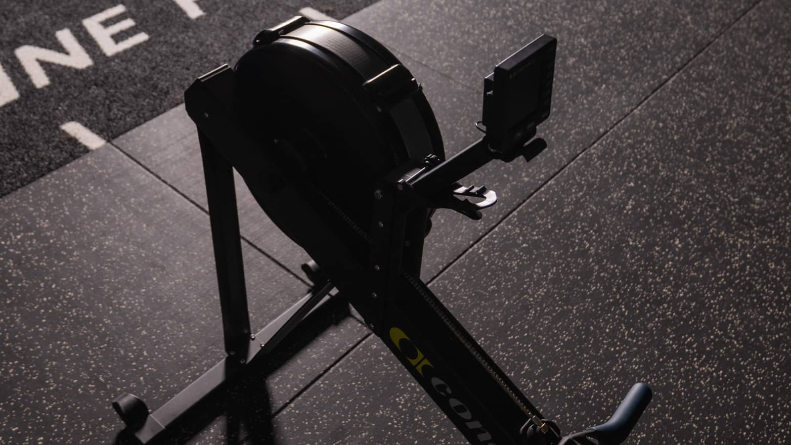 The rower set up and ready on the studio floor